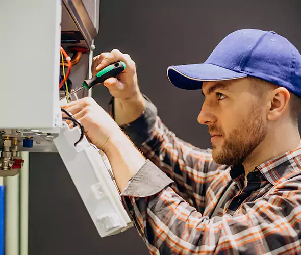Expert Plumber for Tankless Water Heater Maintenance in Holtsville, NY: Schedule Professional Maintenance Services with Us